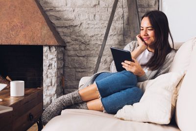 Customer relaxing at home while our team handles the laundry